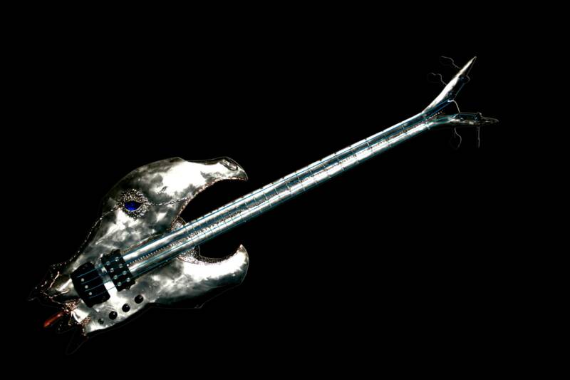 Play the Bass Guitar
